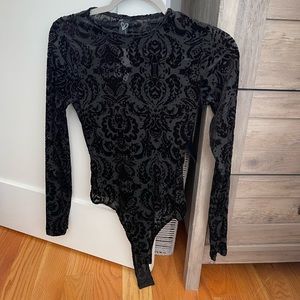 Black sheer longsleeve bodysuit by Windsor